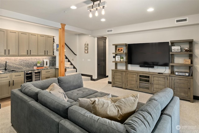 living room featuring beverage cooler and wet bar