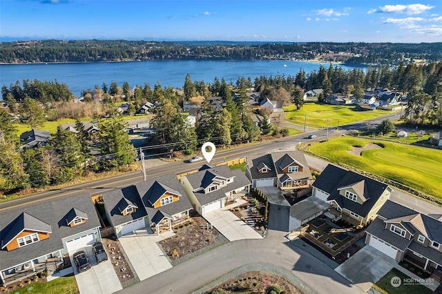 birds eye view of property featuring a water view