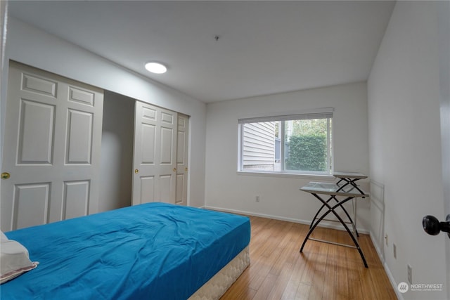 bedroom with light wood-type flooring