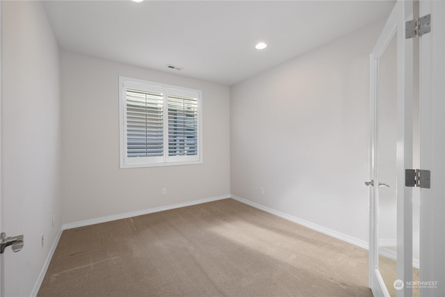 view of carpeted spare room