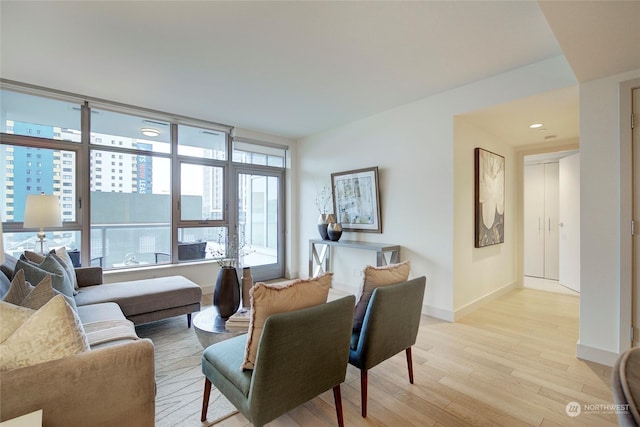 living room with light hardwood / wood-style floors