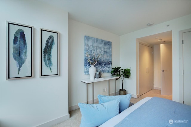 sitting room with light colored carpet