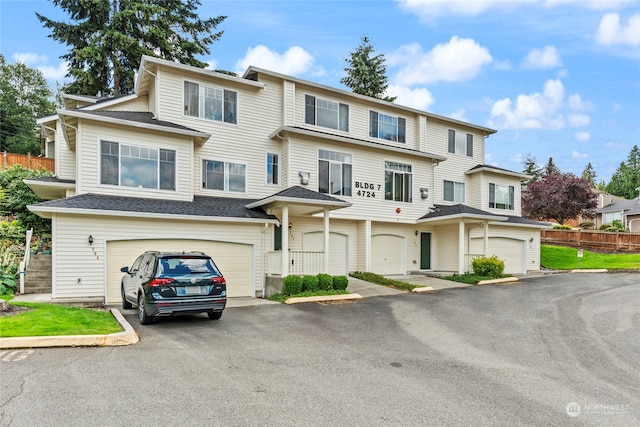 view of front of property with a garage