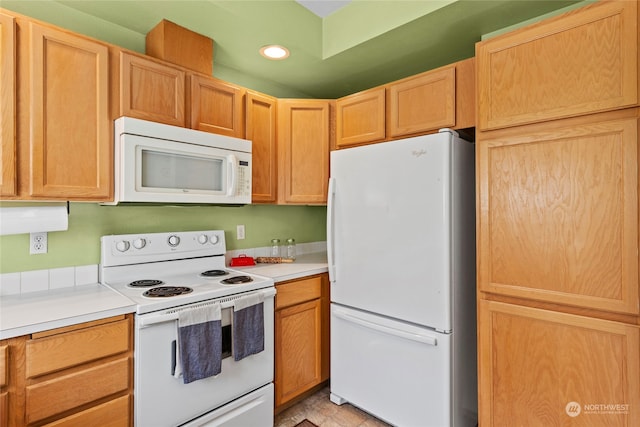 kitchen featuring white appliances