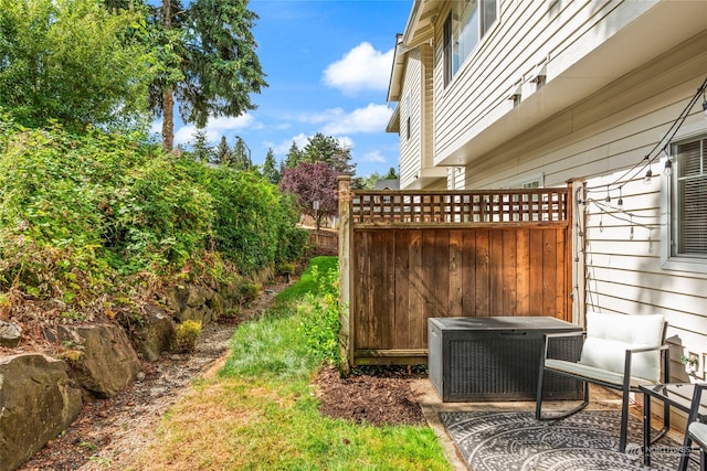 view of yard with central AC unit