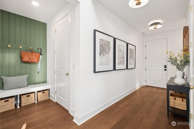 mudroom with dark hardwood / wood-style floors