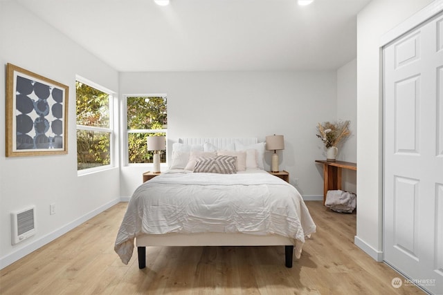 bedroom with light wood-type flooring