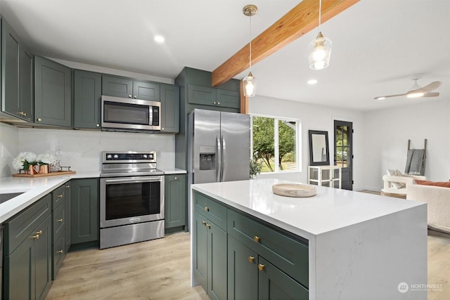 kitchen with decorative light fixtures, a center island, light hardwood / wood-style flooring, beamed ceiling, and stainless steel appliances