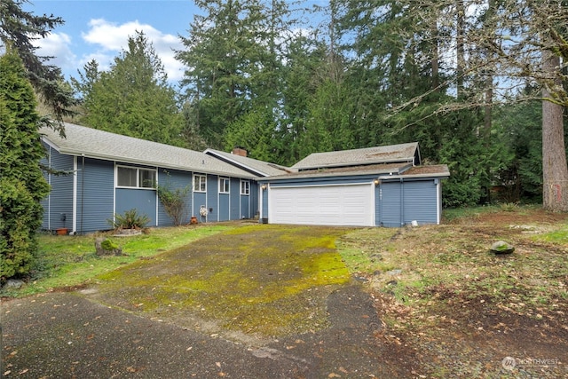 ranch-style house with a garage