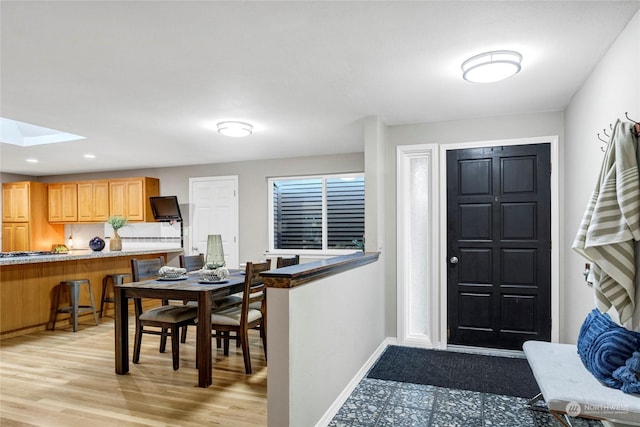 entryway with a skylight