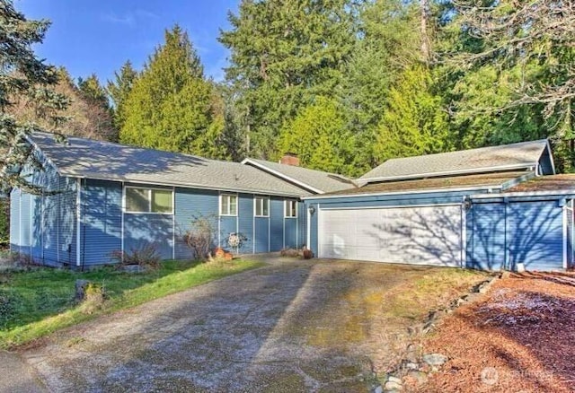 4901 96th Ave W, University Place, WA 98467 - single story home with a chimney and driveway