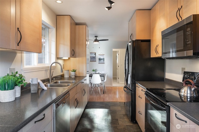 kitchen with sink, stainless steel dishwasher, ceiling fan, black range with electric cooktop, and light brown cabinets