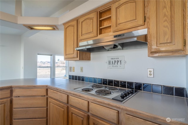 kitchen featuring electric cooktop and kitchen peninsula