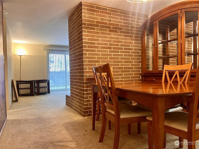 view of carpeted dining area