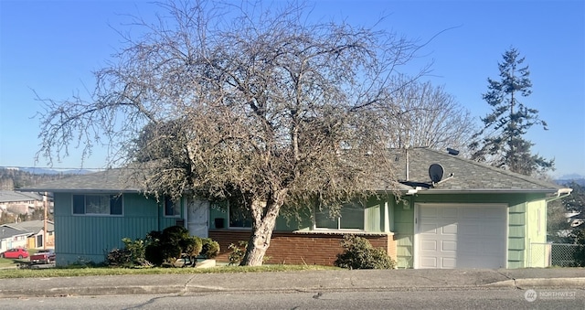 view of front of home featuring a garage