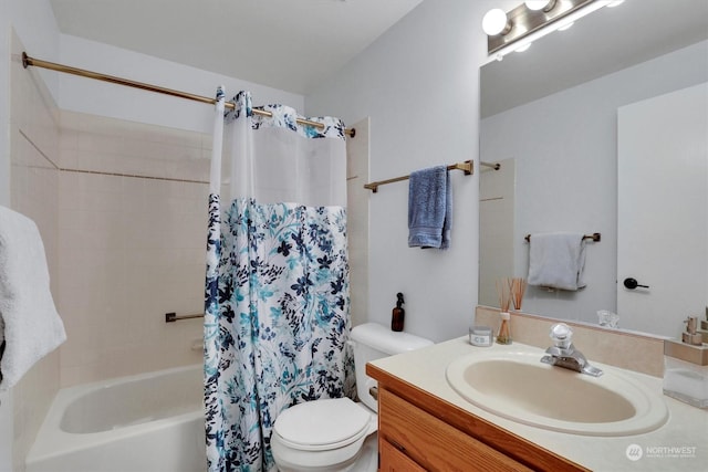 full bathroom with vanity, shower / tub combo with curtain, and toilet