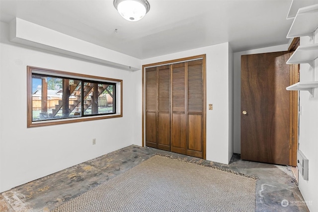 unfurnished bedroom featuring a closet