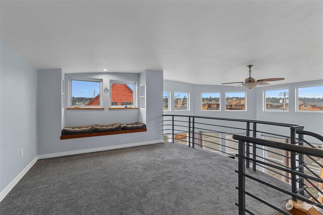 interior space featuring ceiling fan