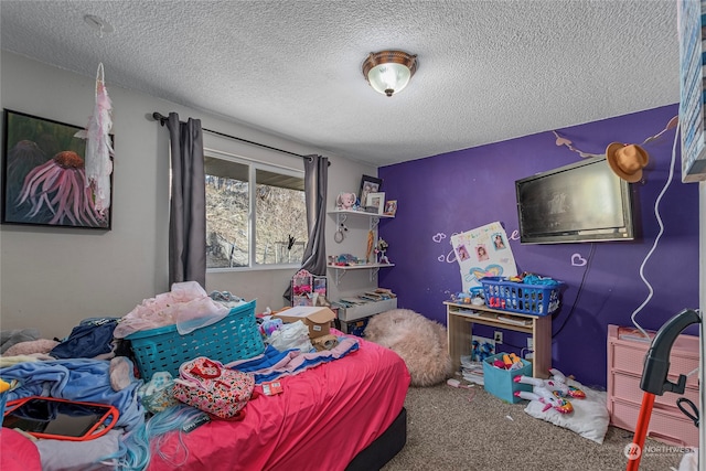 carpeted bedroom featuring a textured ceiling