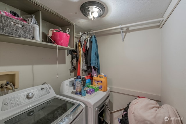 laundry area featuring laundry area and washer and clothes dryer