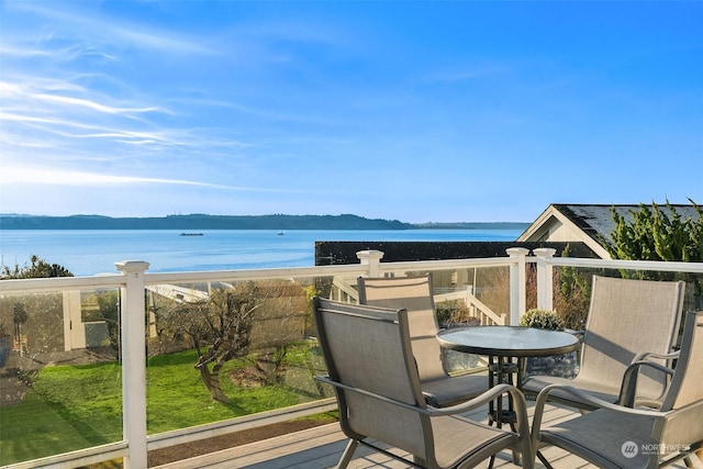 balcony featuring a water view