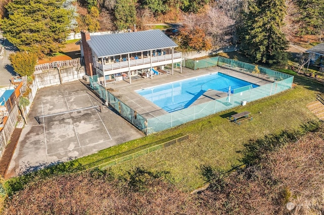 view of pool with a fenced in pool, a yard, fence, and a patio