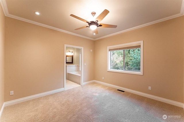 empty room with crown molding, light colored carpet, and ceiling fan