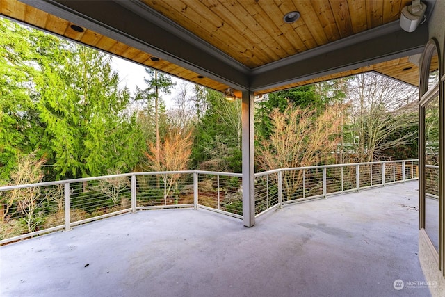 view of patio featuring a balcony