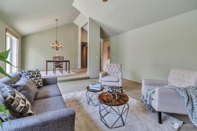 carpeted living room with lofted ceiling and a notable chandelier