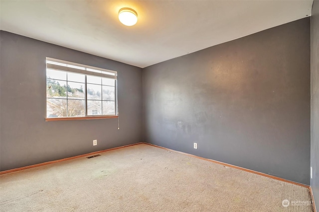 view of carpeted spare room