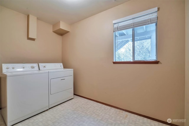 washroom with separate washer and dryer