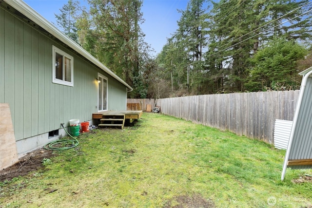 view of yard with a fenced backyard