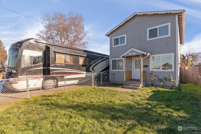 view of front of home with a front yard