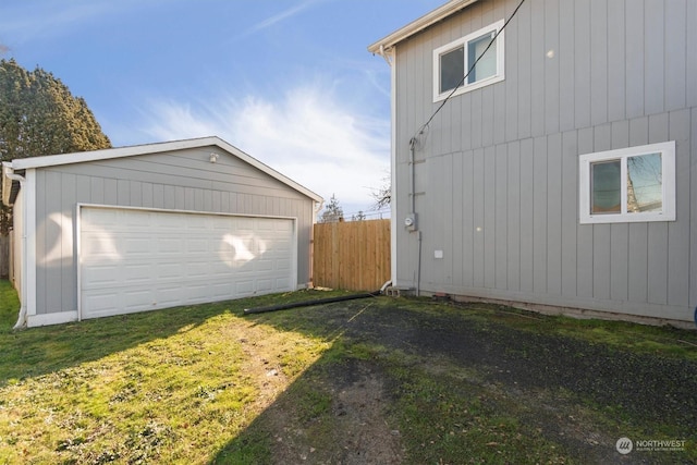 garage with a yard