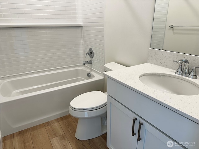 13414 187th Street Ct E Unit 20, Puyallup, WA 98374 - full bathroom featuring vanity, wood finished floors, shower / bath combination, and toilet
