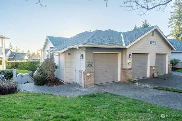 garage with a yard