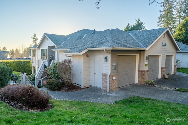 ranch-style home with a garage