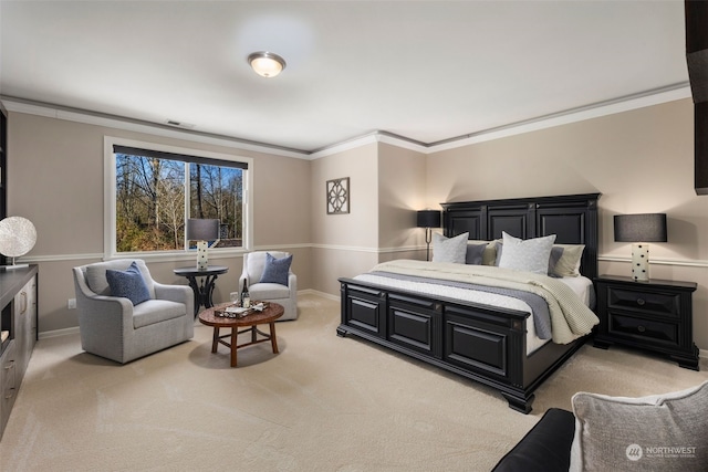 bedroom featuring ornamental molding and light carpet