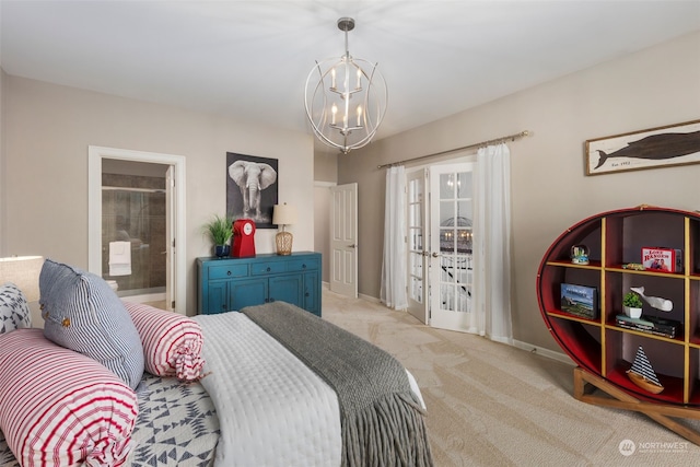 carpeted bedroom featuring a notable chandelier and french doors