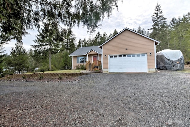 single story home featuring a garage