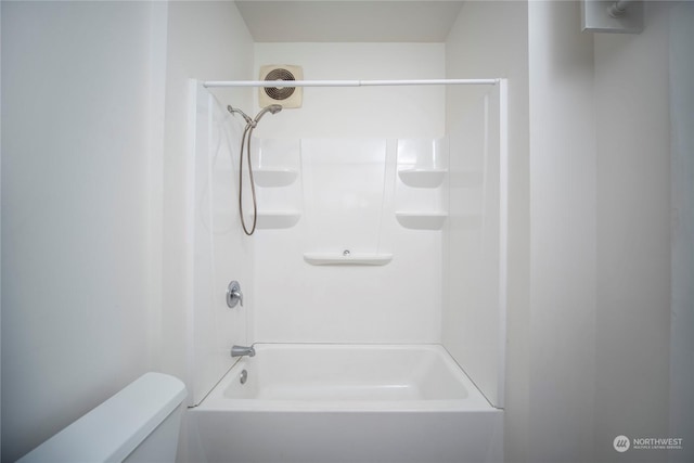 full bathroom featuring visible vents, toilet, and shower / washtub combination