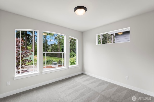6612 6th St E, Tacoma, WA 98424 - carpeted spare room featuring baseboards