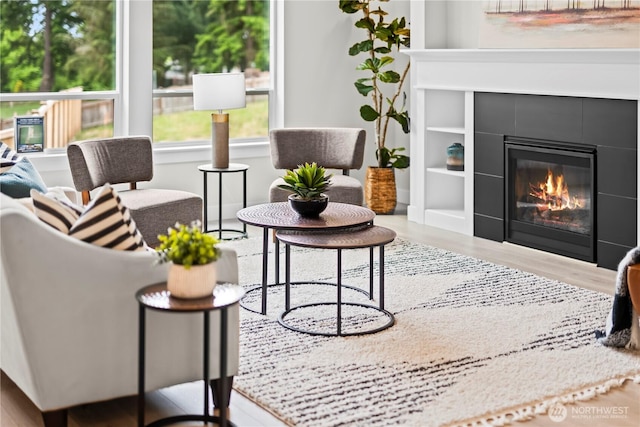 6612 6th St E, Tacoma, WA 98424 - living area featuring wood finished floors and a tile fireplace