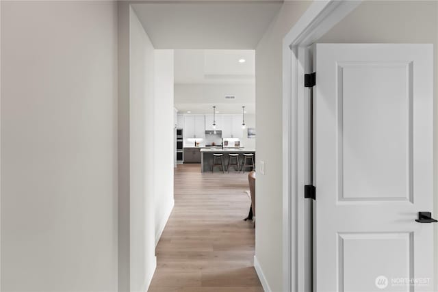 6612 6th St E, Tacoma, WA 98424 - hall featuring light wood-style floors, recessed lighting, and baseboards