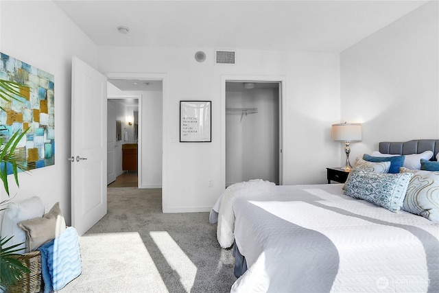 bedroom with carpet, a closet, visible vents, and baseboards