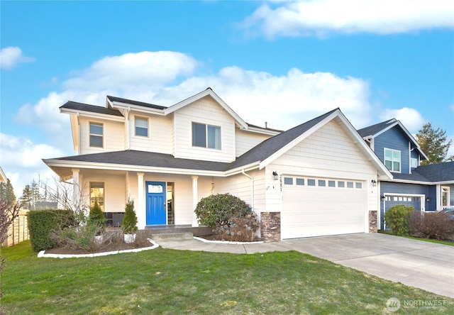 view of front facade with driveway, stone siding, covered porch, an attached garage, and a front yard