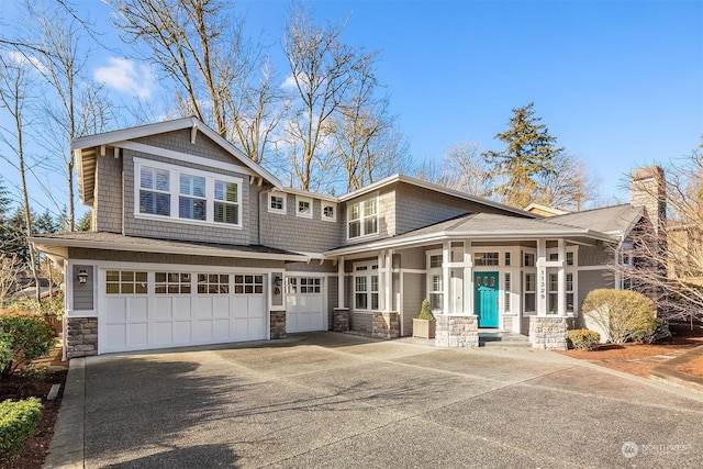 craftsman inspired home with a garage