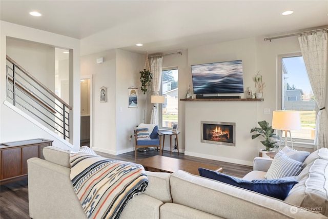 living room featuring dark wood-type flooring