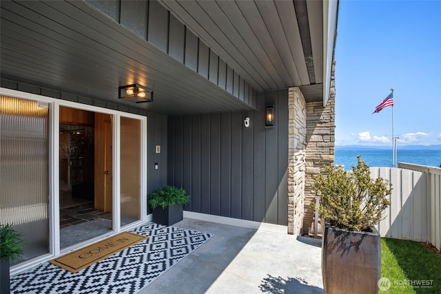 1267 Beach Dr, Camano Island, WA 98282 - doorway to property with a water view and stone siding