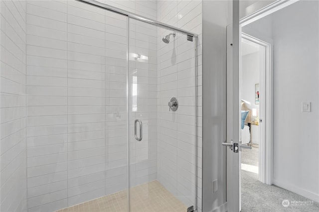 bathroom featuring walk in shower